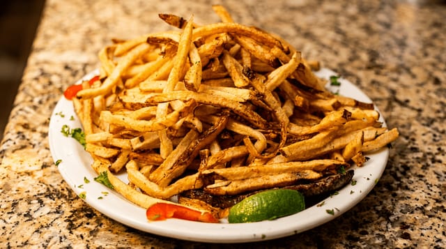 Papas Fritas Naturales.
